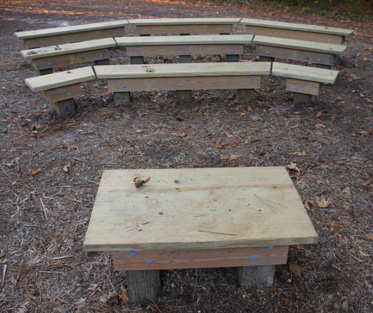 Bench seating for a small audience at the Herbert Bluethenthal Memorial Wildflower Preserve