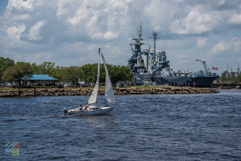 Sailing in front of the USS North Carolina and downtown Wilmington